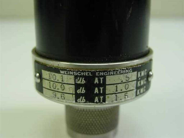 Weinschel Engineering 41922 attenuator label close-up showing 10.1 dB at 0.5 GHz, 10.0 dB at 1.0 GHz, 9.6 dB at 1.5 GHz calibration chart