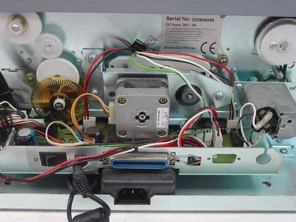 Evolis Kiosk interior view — top-down showing wiring, stepper motors, gear train, parallel port connector, and IEC AC inlet on printer chassis