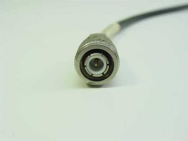 Close-up of TNC male plug (TNC-P) connector end of Gremar 102-9112-003 coaxial cable, showing center pin and threaded coupling