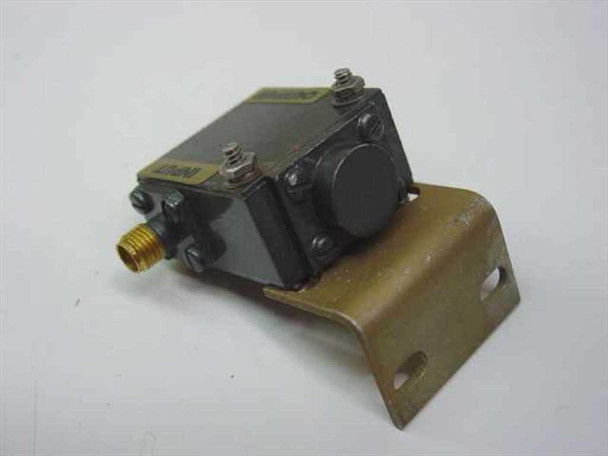 E&M Laboratories S12T82 RF isolator — opposite angled view showing body and mounting bracket profile