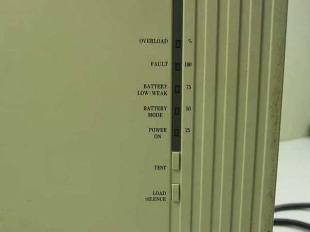 Minuteman PML2000 UPS front panel close-up showing Overload, Fault, Battery Low/Weak, Battery Mode, Power On LED indicators plus TEST and LOAD SILENCE buttons