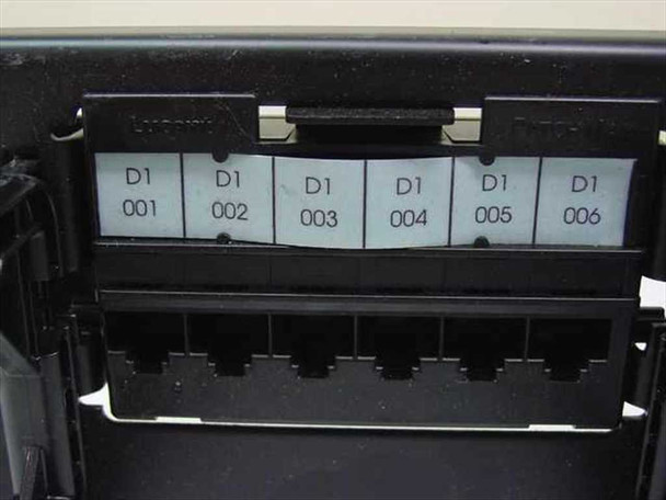 Close-up of Lucent 110 patch panel module with port labels D1 001 through D1 006 and RJ-style jacks below