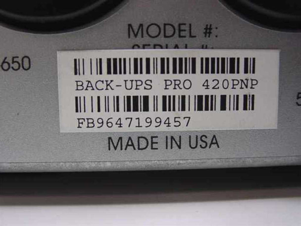 APC Back-UPS Pro 420PNP model label close-up: model 420PNP, serial FB9647199457, Made in USA