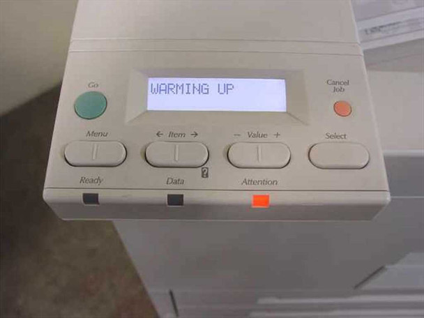 HP LaserJet 8150DN — front control panel displaying 'WARMING UP' on LCD screen with Go, Menu, Cancel Job, and Select buttons