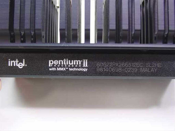 Intel Pentium II SL2HE 266MHz Slot 1 CPU – label close-up showing OPN 80522PX266512EC, sSpec SL2HE, MMX branding, and Malaysia origin