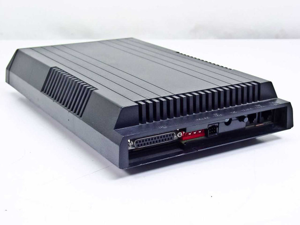 Microcom QX/12K external modem – rear and top view showing ventilation fins and port area