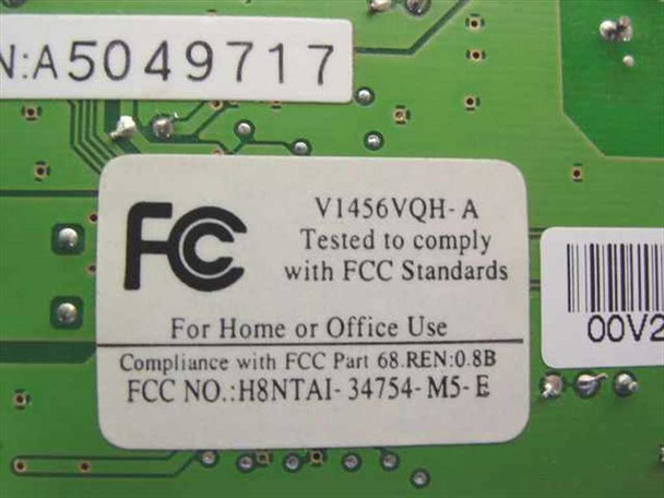 Askey V1456VQH-A PCB label showing model number, FCC ID H8NTAI-34754-M5-E, Part 68 compliance, and serial number A5049717