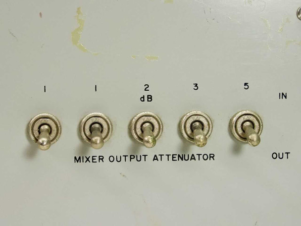 ASM-16A mixer output attenuator detail — five toggle switches labeled 1, 1, 2 dB, 3, 5 with IN and OUT ports