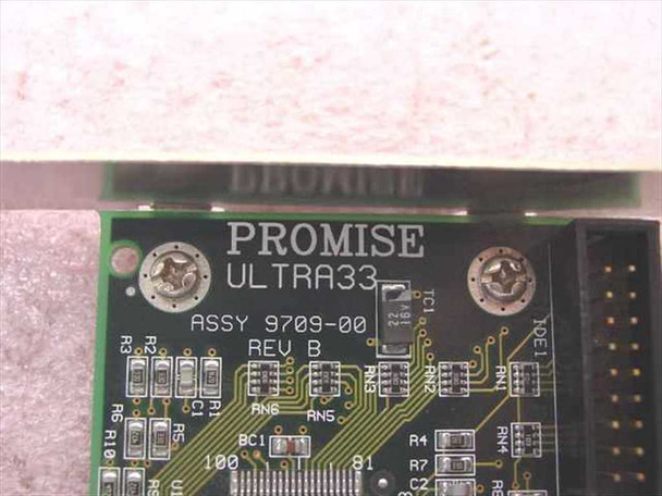 Promise Ultra33 PCB close-up showing ASSY 9709-00 Rev B silkscreen label and component detail