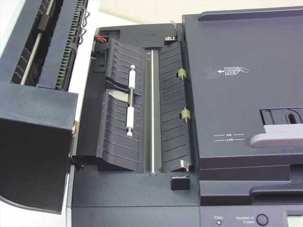 Dell 964 ADF (automatic document feeder) interior — paper feed rollers and paper guides visible with lid open
