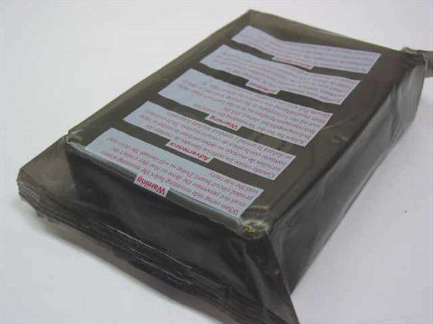Quantum Atlas III TD18W011 SCSI hard drive in sealed anti-static bag — side and top angle view