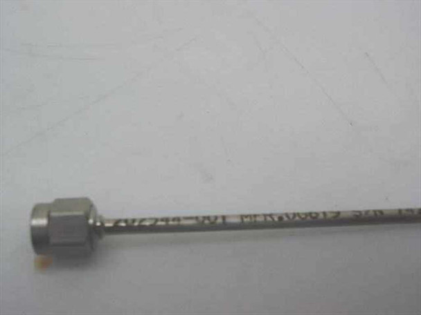 Close-up of 202544-001 label and SMA-M male connector on stainless steel coaxial cable