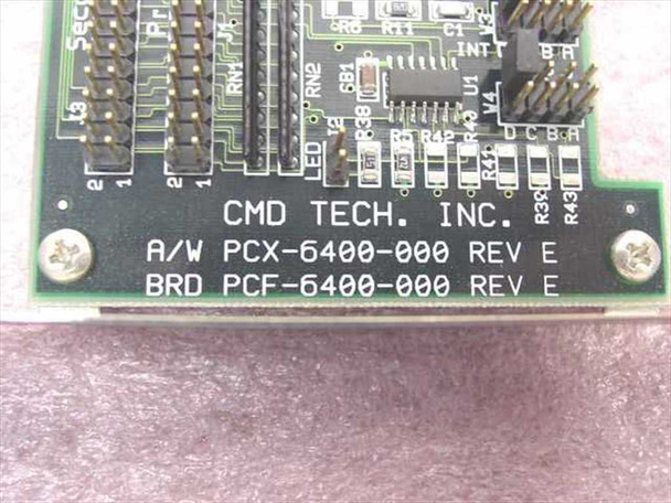 CMD Tech Inc. PCB label closeup showing A/W PCX-6400-000 Rev E and BRD PCF-6400-000 Rev E silk-screened on green PCB