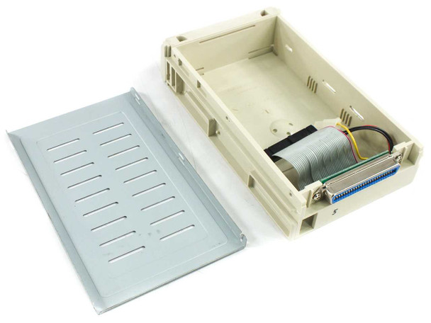 Cybernet VP-15 IDE caddy – open view with metal lid removed showing internal 40-pin ribbon cable and Molex power connector