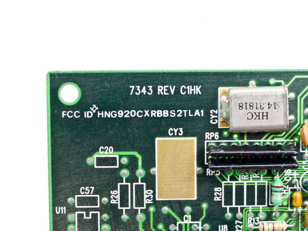 Trident 7343 Rev C1HK close-up of PCB label showing model number, revision, FCC ID HNG920CXRBBS2TLA1, and HKC 14.31818 MHz crystal