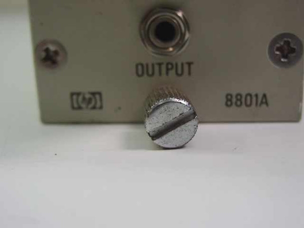 HP 8801A — bottom close-up showing OUTPUT label, HP logo, model number 8801A, and output adjustment screw