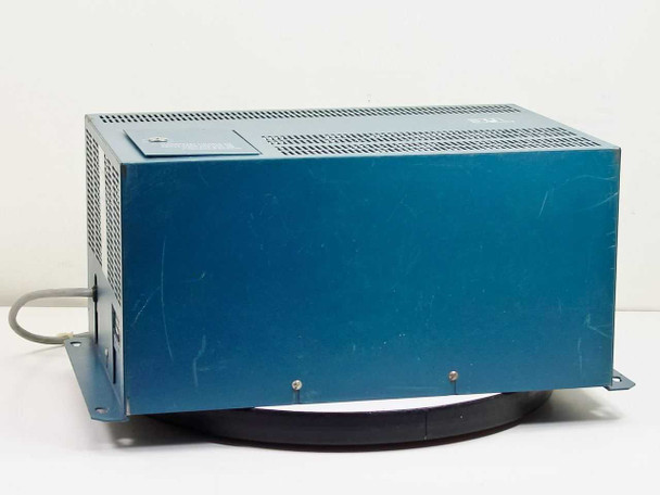 Tie Communications 2260A PBX Telephone Power Supply – rear-left angled view showing solid blue enclosure side and base mounting flanges