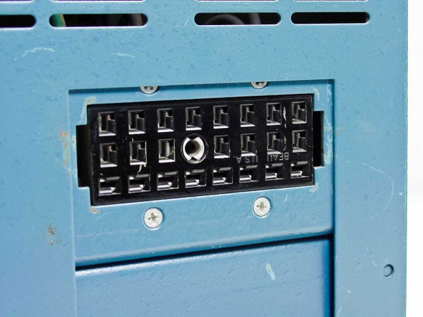 Tie Communications 2260A – rear output connector block showing multi-pin terminal block for DC power output connections