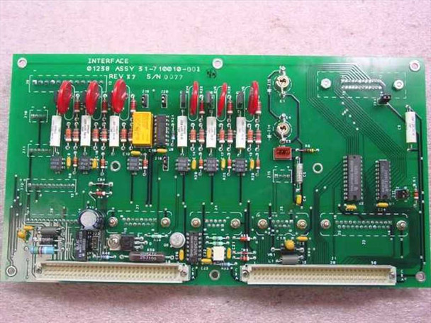 Interface 31-710010-001 Rev X7 PCB — close top view of board label showing INTERFACE, Assy 31-710010-001, REV X7, S/N 0077