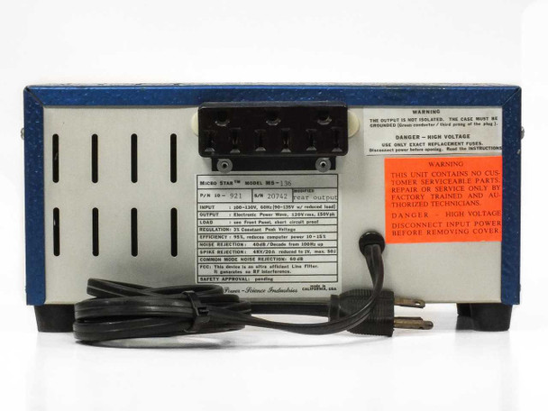 Micro Star MS-136 rear panel full view showing 3-outlet block, rating plate, and warning labels