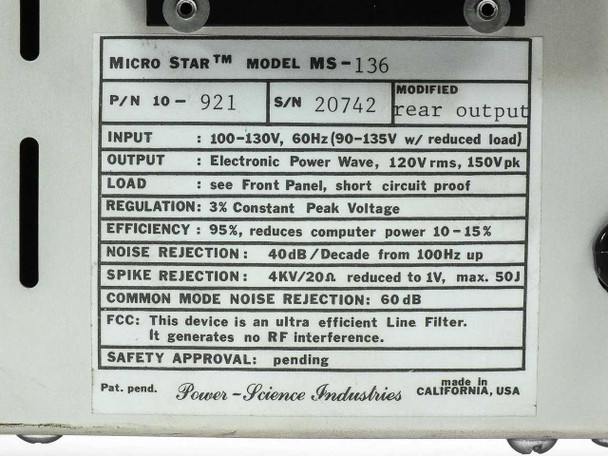 Micro Star MS-136 rating plate macro showing full specifications: input, output, efficiency, noise rejection, spike rejection, and FCC note