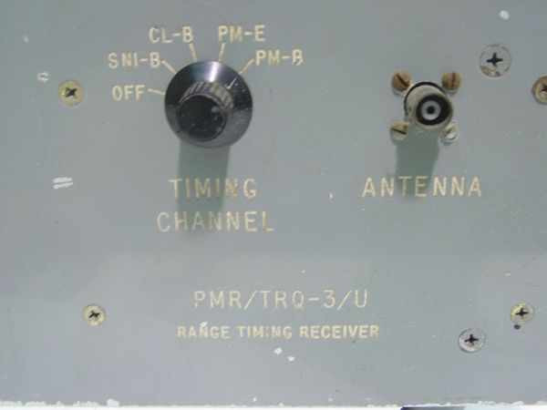 PMR/TRQ-3/U Range Timing Receiver – close-up of front panel showing Timing Channel rotary switch (CL-B, PM-E, PM-B, SNI-B, OFF) and Antenna BNC connector with model designation label