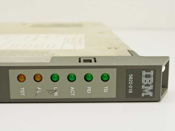 IBM 5822-018 front panel close-up showing TST, AL, LNK, ACT, RD, TD LED indicators and IBM logo