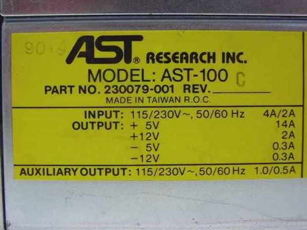 AST Research AST-100 rating label – model, part number 230079-001, input/output voltage and current specifications
