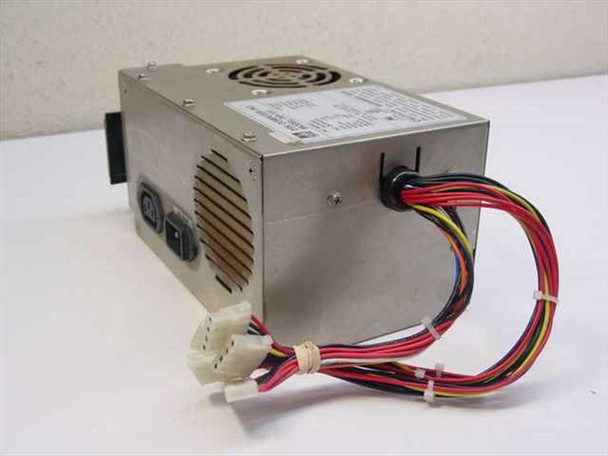 DTK Computer PIP-151 AT power supply – left-side view showing ventilation slots, push-button connector panel, and full output wire harness