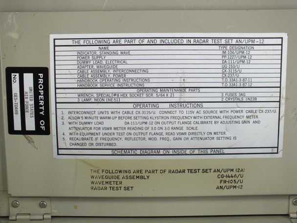 AN/UPM-12A interior placard listing included components: IM-104, PP-1227, DA-111, CX-3115/U, CX-237/U, handbooks, and operating maintenance parts