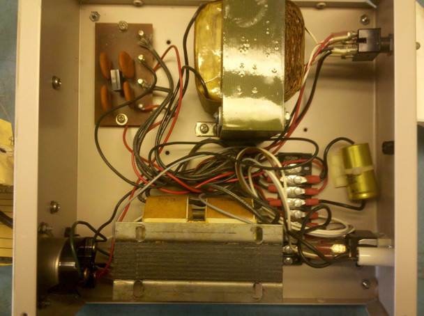 Rudolph Model 600 Power Supply – interior view showing transformer, rectifier board, filter capacitor, and internal wiring