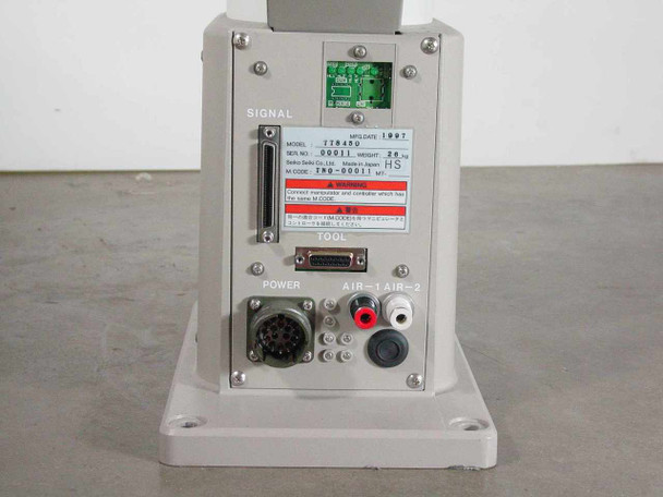 Seiko TT8450 base panel showing MODEL TT8450 label, SIGNAL DB-25 port, TOOL DB-15 port, POWER multi-pin circular connector, and AIR-1 AIR-2 pneumatic ports