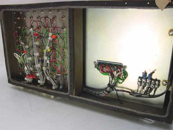 Interior view of Tele-Signal 684A chassis showing hand-wired circuit assemblies with color-coded wiring and a multi-pin connector on the right bay