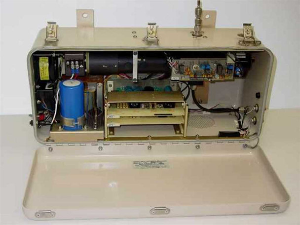 Climet CI-221 particle counter — interior view with lid open showing internal PCBs, capacitor, and optical sensor assembly