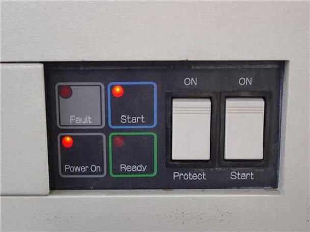 Fujitsu M2361A front panel control cluster close-up — Fault, Start, Power On, and Ready indicator buttons with LEDs; Protect and Start rocker switches both in ON position