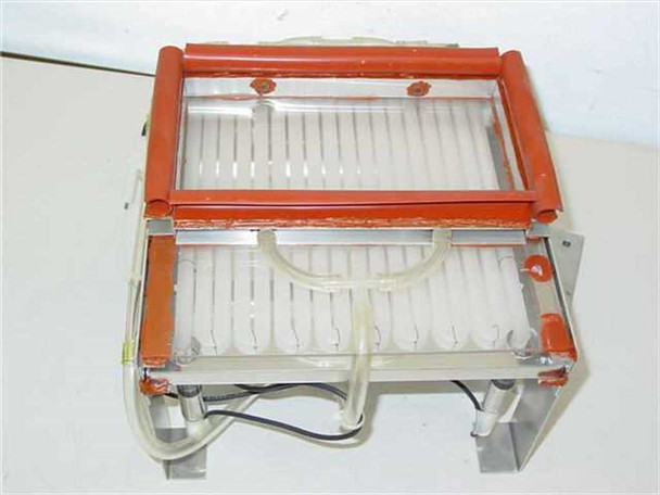 UV light frame side view showing red-sealed upper UV lamp housing lifted on pneumatic cylinders above lower tray section with visible clear flex tubing