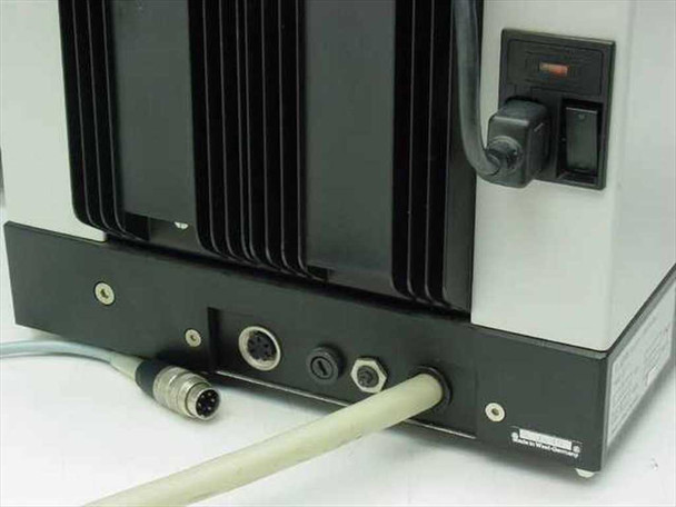 Reichert-Jung 2050 rear panel — circular DIN connectors, power switch, heatsink fins, and cable connections