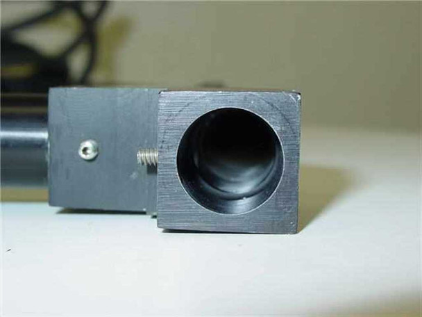 Illuminated optical tube front end showing open circular aperture with aluminum machined tip