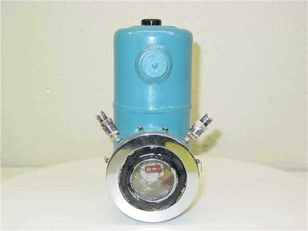 Cryogenic Associates R-141212-75 high vacuum container — front view showing large circular optical viewport with stainless flange and two side ports on the teal body