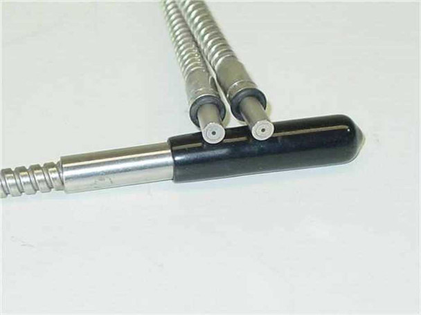 Banner 753S fiber end assembly — close-up of bifurcated black tip housing showing two fiber terminations side by side