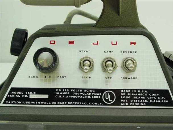 DeJur Amsco 750-B control panel showing De Jur nameplate, speed dial, Start/Stop toggle, Lamp On/Off toggle, Forward/Reverse toggle, and rating plate reading 110-125V AC-DC 10A 750W