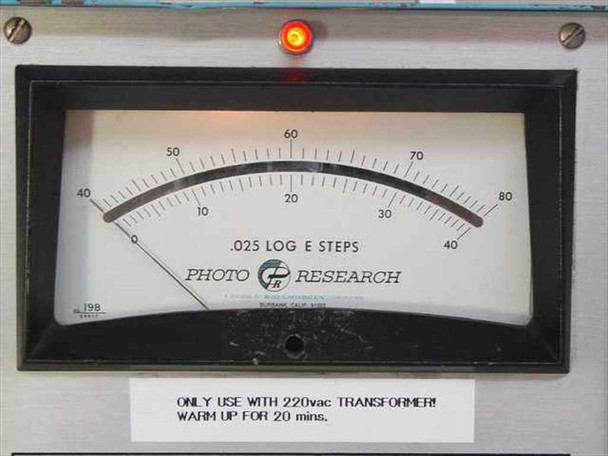 Photo Research Spectra 900-OP-C meter face showing .025 Log E Steps scale with dual ranges 0-40 and 40-80, and 220V transformer warning label
