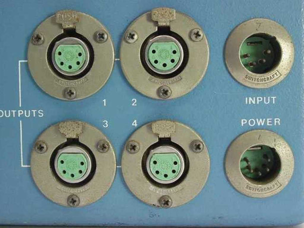 ZC-706C rear connector panel close-up — four Switchcraft circular multi-pin output connectors (1–4), input connector, and power connector with OUTPUTS and INPUT labels