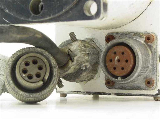 Photo-Sonics Series GOV motor — close-up of multi-pin circular military-style connectors showing corrosion on connector housing and pins