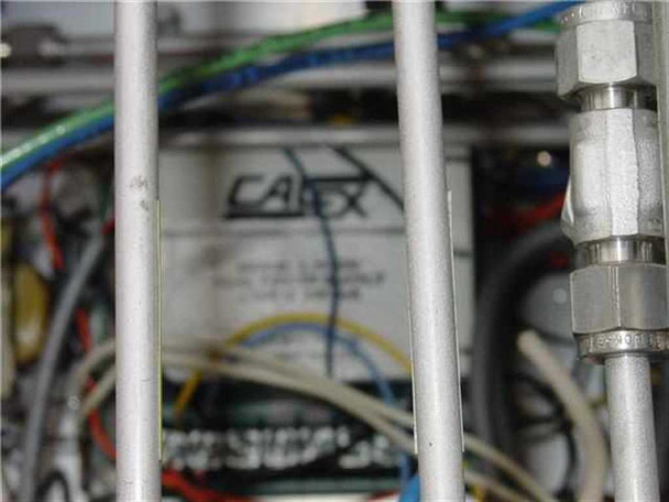 Partially visible component label inside XP16 gas controller chassis — text not fully legible