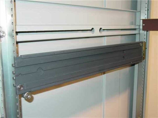 Varian 1015230 rackmount cabinet close-up of heavy-duty extra-duty slide rail and blank panel detail on 19-inch rack rails