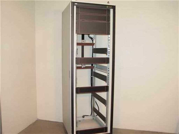 Varian 1015230 VZC 19-inch rackmount cabinet enclosure, front three-quarter view showing interior rails and waveguides with door open