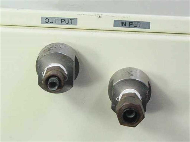 Taitec CL-300 Coolnit rear fluid ports — OUTPUT and INPUT barbed fittings for external recirculation circuit