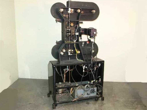 Elicon Ultradrive 600 optical film printer — rear/side view showing film transport arm, exposed wiring harness, and open base cabinet with motor and components
