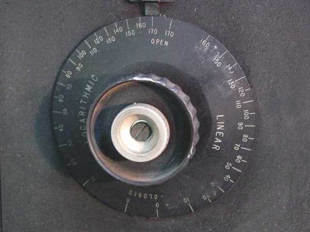Elicon Ultradrive 600 logarithmic/linear exposure control dial — large rotary dial with dual scales (logarithmic and linear) and open-position markings, showing lens aperture port at center